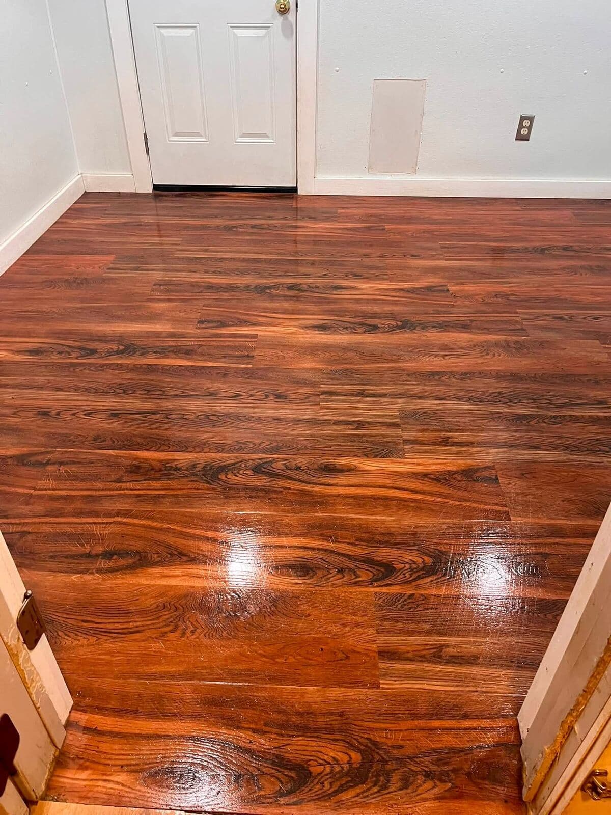 Wood floor polished to a mirror shine
